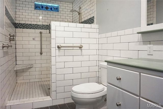 301 S Meramec St, St James, MO 65559 - bathroom with tile walls, a walk in shower, and vanity
