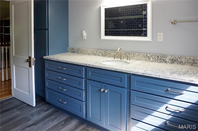 301 S Meramec St, St James, MO 65559 - bathroom with wood finished floors and vanity