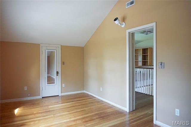 301 S Meramec St, St James, MO 65559 - spare room featuring lofted ceiling and light wood-type flooring