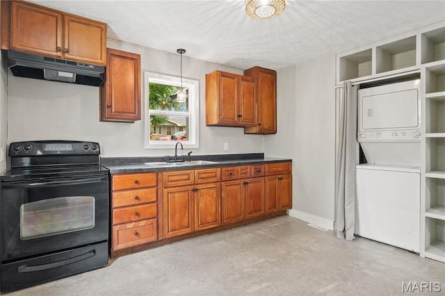 233 Oconnell St, Cape Girardeau, MO 63701 - kitchen featuring black / electric stove, under cabinet range hood, stacked washing machine and dryer, a sink, and brown cabinets