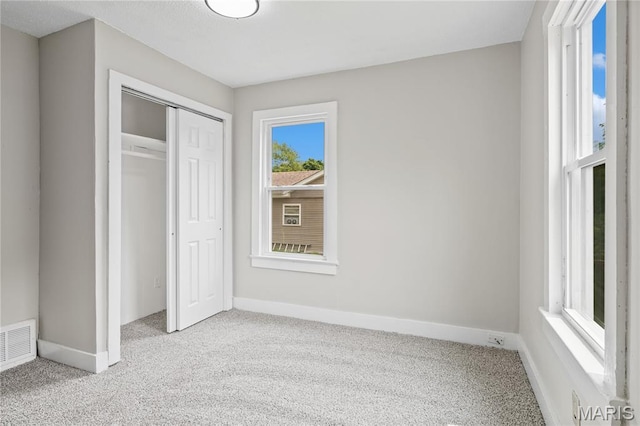 233 Oconnell St, Cape Girardeau, MO 63701 - unfurnished bedroom featuring carpet, baseboards, and a closet
