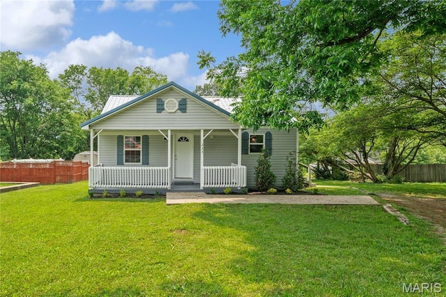 233 Oconnell St, Cape Girardeau, MO 63701 - view of front of property featuring a porch and metal roof