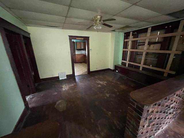 20621 County Highway 22, Hoyleton, IL 62803 - unfurnished bedroom with baseboards and a paneled ceiling