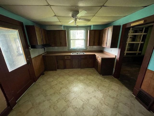 20621 County Highway 22, Hoyleton, IL 62803 - kitchen featuring a sink, light flooring, ceiling fan, a drop ceiling, and light countertops