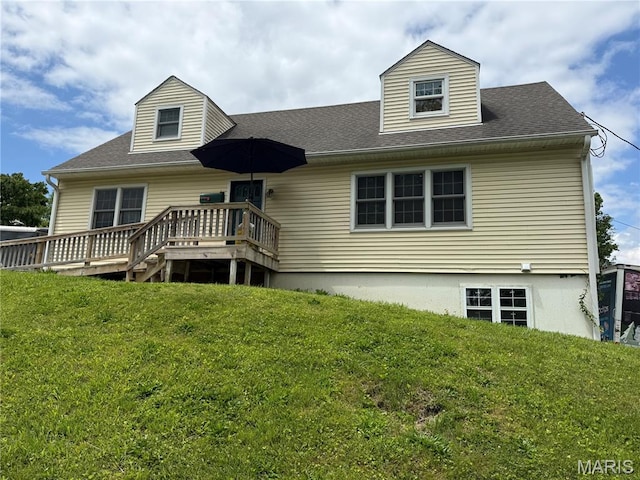 905 Dewitt St, Hannibal, MO 63401 - rear view of property with a lawn, a deck, and a shingled roof