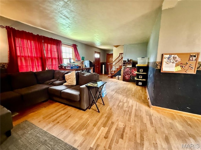 905 Dewitt St, Hannibal, MO 63401 - living room with wood finished floors and stairs