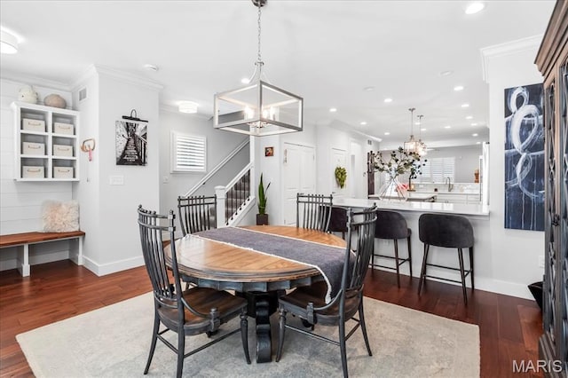 7723 Dale Ave, Richmond Heights, MO 63117 - dining room with a chandelier, stairs, wood finished floors, baseboards, and recessed lighting