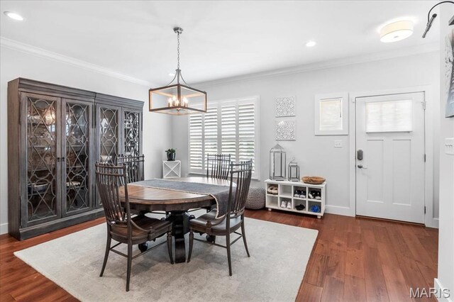 7723 Dale Ave, Richmond Heights, MO 63117 - dining area featuring a chandelier, ornamental molding, wood finished floors, recessed lighting, and baseboards