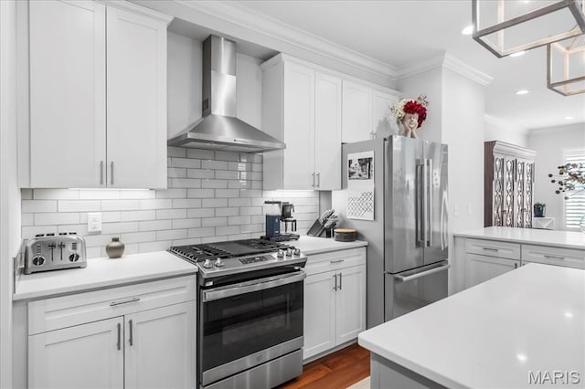 7723 Dale Ave, Richmond Heights, MO 63117 - kitchen featuring stainless steel appliances, wall chimney exhaust hood, crown molding, white cabinets, and light countertops