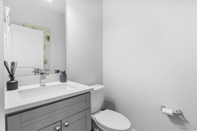 7723 Dale Ave, Richmond Heights, MO 63117 - bathroom featuring vanity and toilet