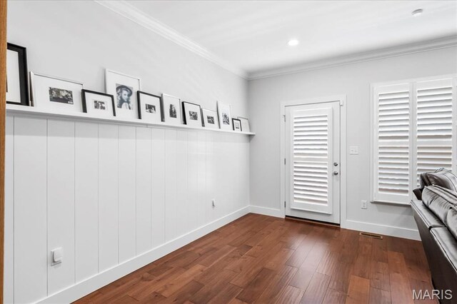 7723 Dale Ave, Richmond Heights, MO 63117 - doorway featuring dark wood-type flooring, baseboards, crown molding, and recessed lighting