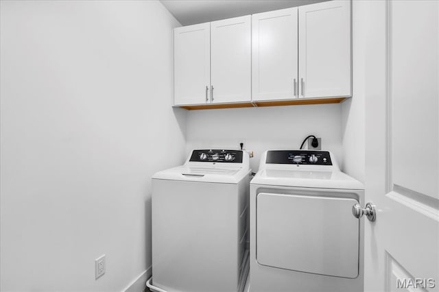 7723 Dale Ave, Richmond Heights, MO 63117 - washroom featuring cabinet space and independent washer and dryer