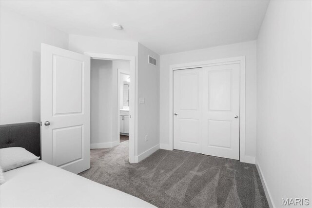 7723 Dale Ave, Richmond Heights, MO 63117 - bedroom featuring carpet, baseboards, and a closet