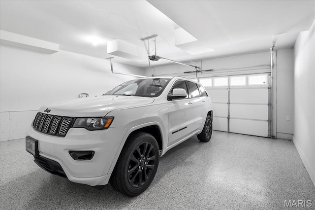7723 Dale Ave, Richmond Heights, MO 63117 - garage featuring a garage door opener