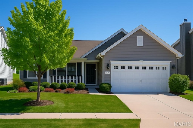 119 Hidden Bluffs Dr, Lake St Louis, MO 63367 - view of front of home with a front lawn, concrete driveway, and an attached garage