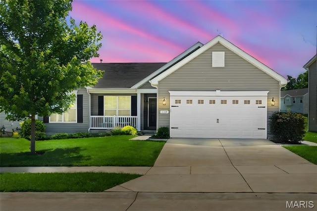 119 Hidden Bluffs Dr, Lake St Louis, MO 63367 - ranch-style house featuring a lawn, driveway, covered porch, and a garage