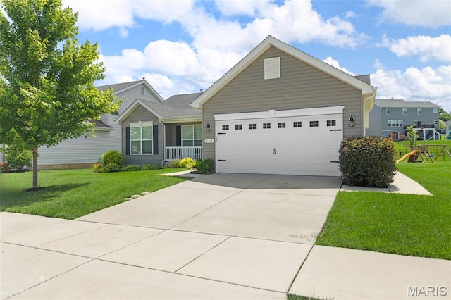 119 Hidden Bluffs Dr, Lake St Louis, MO 63367 - ranch-style home with concrete driveway, an attached garage, a front lawn, and a playground