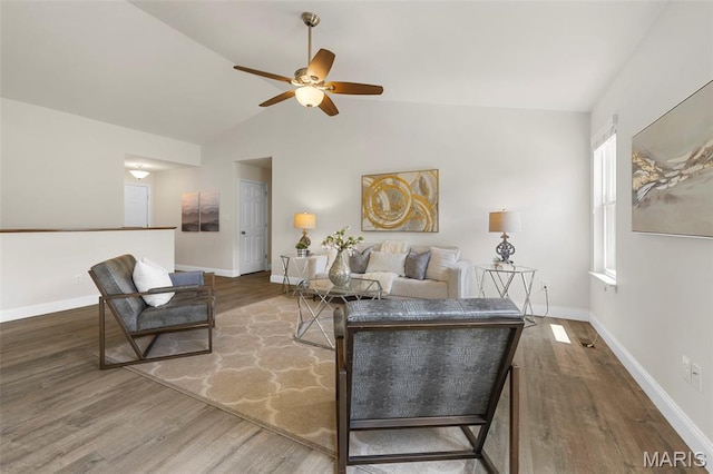 119 Hidden Bluffs Dr, Lake St Louis, MO 63367 - living area with wood finished floors, ceiling fan, and vaulted ceiling