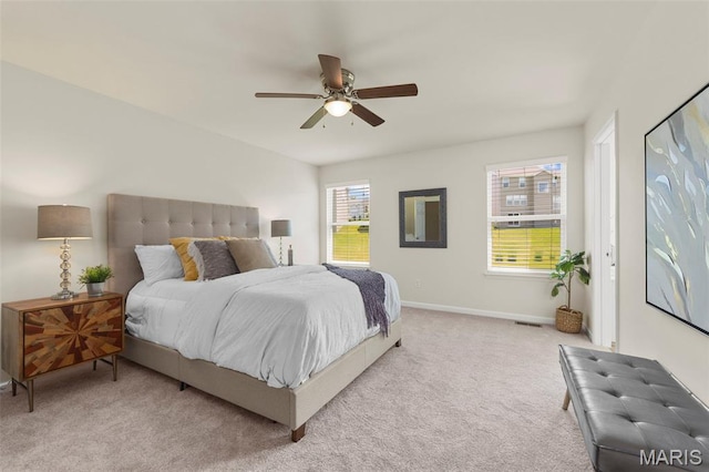 119 Hidden Bluffs Dr, Lake St Louis, MO 63367 - bedroom featuring light carpet and a ceiling fan