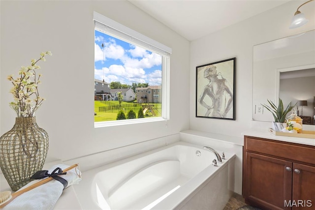 119 Hidden Bluffs Dr, Lake St Louis, MO 63367 - bathroom featuring vanity and a bath