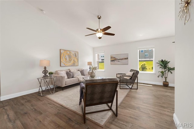 119 Hidden Bluffs Dr, Lake St Louis, MO 63367 - living area featuring plenty of natural light, wood finished floors, ceiling fan, and vaulted ceiling