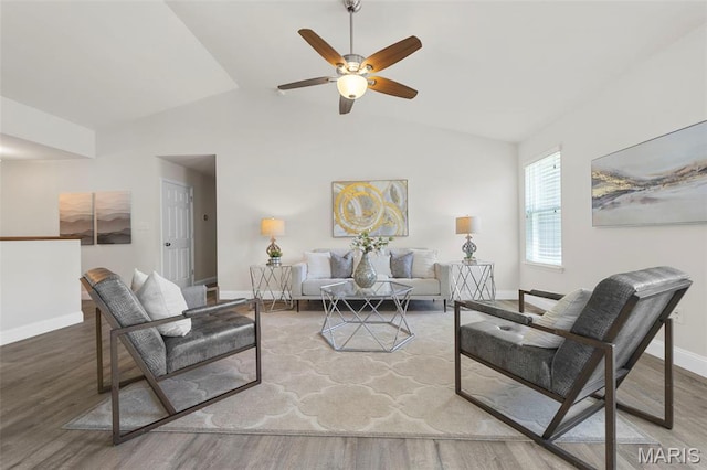 119 Hidden Bluffs Dr, Lake St Louis, MO 63367 - living room featuring a ceiling fan, wood finished floors, and vaulted ceiling