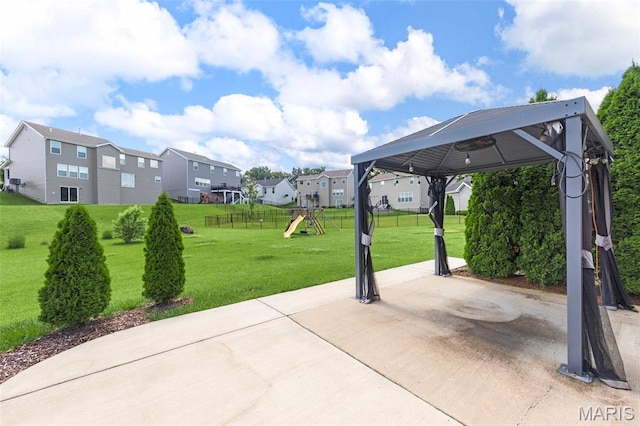 119 Hidden Bluffs Dr, Lake St Louis, MO 63367 - view of patio with a playground, a residential view, and a gazebo