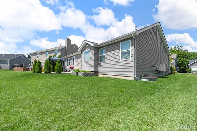 119 Hidden Bluffs Dr, Lake St Louis, MO 63367 - rear view of property with a yard