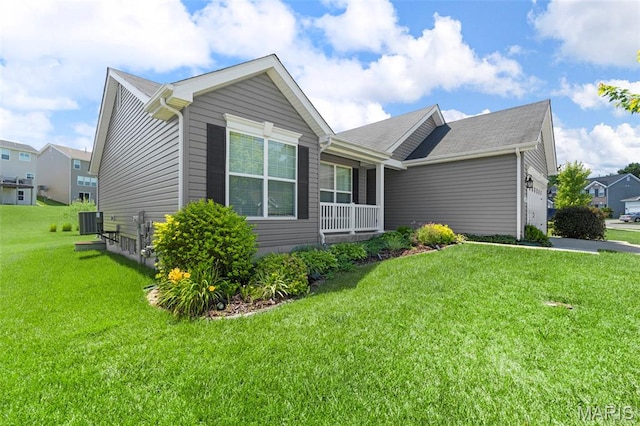119 Hidden Bluffs Dr, Lake St Louis, MO 63367 - view of side of property with a yard, an attached garage, and a porch