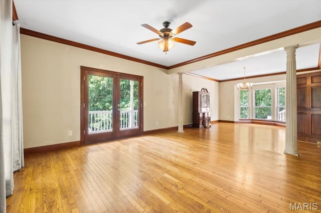 1519 Scofield Valley Ln, Wildwood, MO 63038 - unfurnished room with ornate columns, a chandelier, hardwood / wood-style floors, ceiling fan, and crown molding