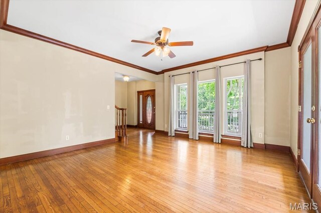 1519 Scofield Valley Ln, Wildwood, MO 63038 - spare room featuring light wood-style flooring, crown molding, and ceiling fan