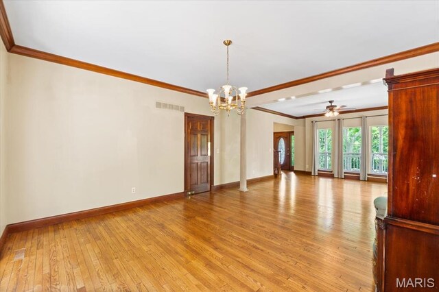 1519 Scofield Valley Ln, Wildwood, MO 63038 - empty room featuring ornamental molding, a chandelier, light wood finished floors, and a ceiling fan