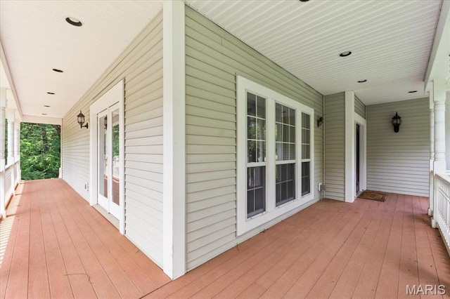 1519 Scofield Valley Ln, Wildwood, MO 63038 - wooden porch featuring french doors