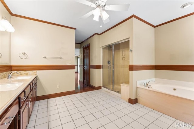 1519 Scofield Valley Ln, Wildwood, MO 63038 - bathroom featuring a shower stall, a garden tub, double vanity, tile patterned flooring, and crown molding