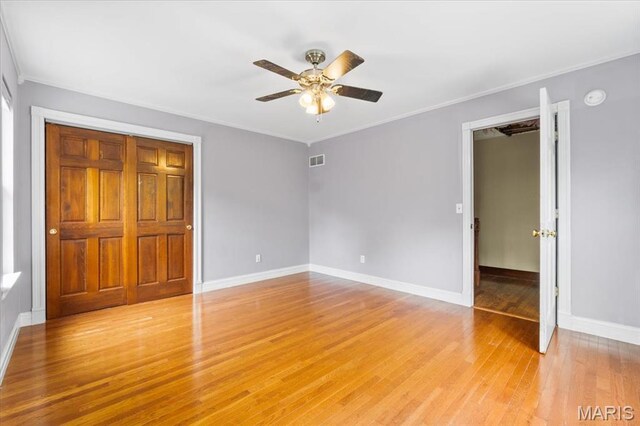 1519 Scofield Valley Ln, Wildwood, MO 63038 - unfurnished bedroom with light wood-style flooring, ornamental molding, and a ceiling fan