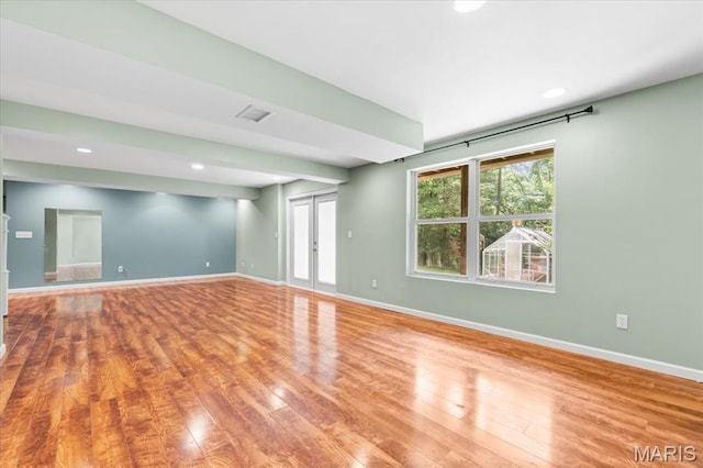 1519 Scofield Valley Ln, Wildwood, MO 63038 - empty room featuring wood finished floors and recessed lighting
