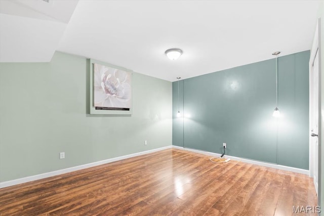 1519 Scofield Valley Ln, Wildwood, MO 63038 - empty room featuring wood finished floors and baseboards