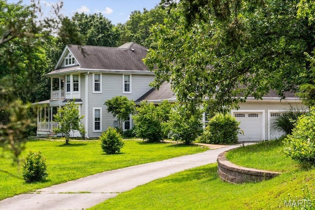 1519 Scofield Valley Ln, Wildwood, MO 63038 - view of front of house with a front yard, driveway, and a garage