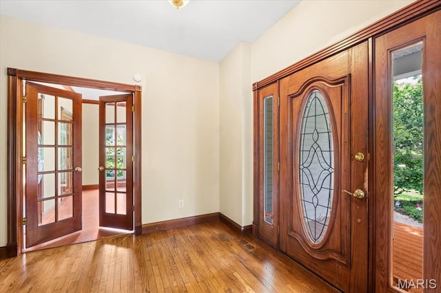 1519 Scofield Valley Ln, Wildwood, MO 63038 - foyer with french doors, hardwood / wood-style floors, and healthy amount of natural light