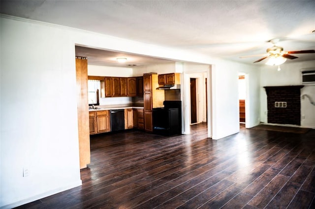216 Patty Lynn Dr, Kennett, MO 63857 - kitchen featuring black appliances, ceiling fan, plenty of natural light, and a fireplace
