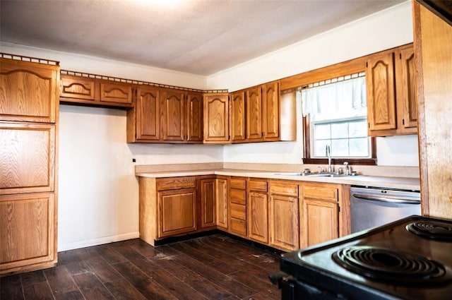 216 Patty Lynn Dr, Kennett, MO 63857 - kitchen featuring a sink, dishwasher, brown cabinets, and light countertops