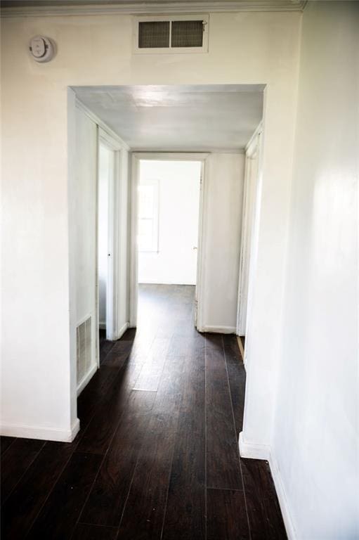 216 Patty Lynn Dr, Kennett, MO 63857 - corridor with dark wood-style flooring and baseboards