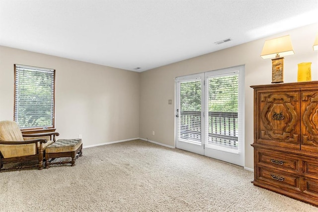 15017 Baxter Vlg Unit B, Chesterfield, MO 63017 - living area with carpet flooring and baseboards
