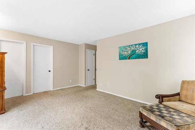 15017 Baxter Vlg Unit B, Chesterfield, MO 63017 - sitting room with carpet floors and baseboards