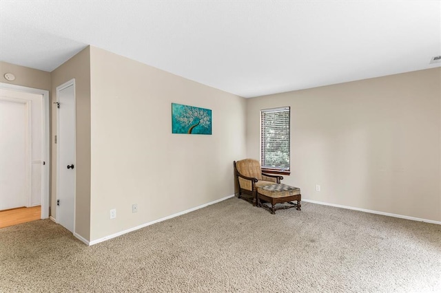 15017 Baxter Vlg Unit B, Chesterfield, MO 63017 - living area featuring carpet and baseboards