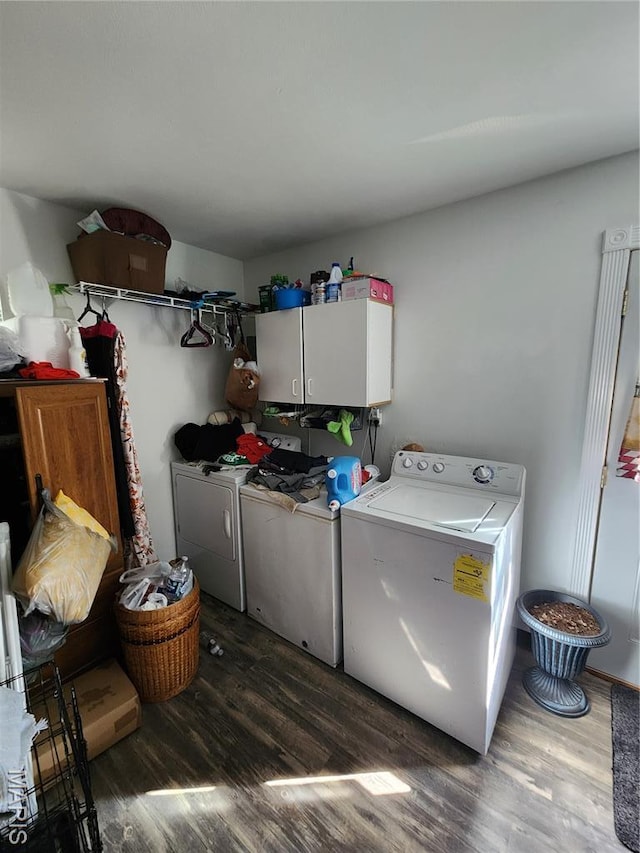 1520 Flicker Dr, Florissant, MO 63031 - washroom featuring cabinet space, independent washer and dryer, and wood finished floors
