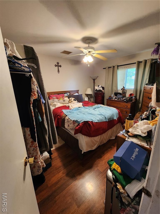 1520 Flicker Dr, Florissant, MO 63031 - bedroom featuring wood finished floors and a ceiling fan