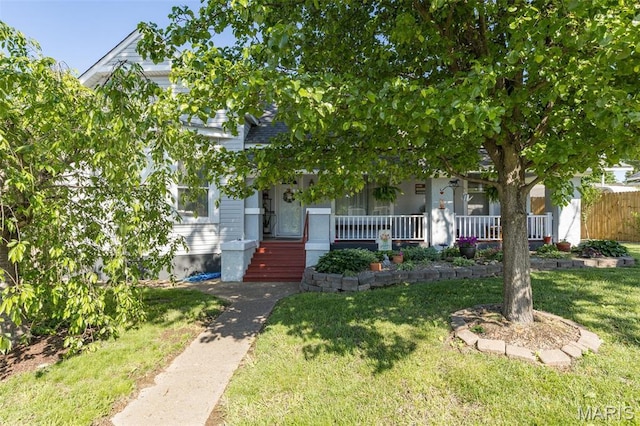 406 N Division St, Bonne Terre, MO 63628 - obstructed view of property featuring a porch