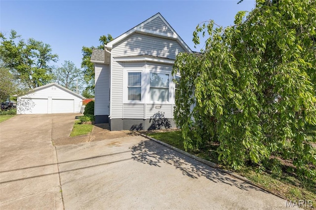406 N Division St, Bonne Terre, MO 63628 - view of front of property with an outdoor structure and a detached garage
