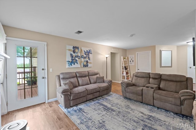 1001 Windstream Dr Unit 32, Saint Peters, MO 63376 - living room with light wood-style floors and baseboards